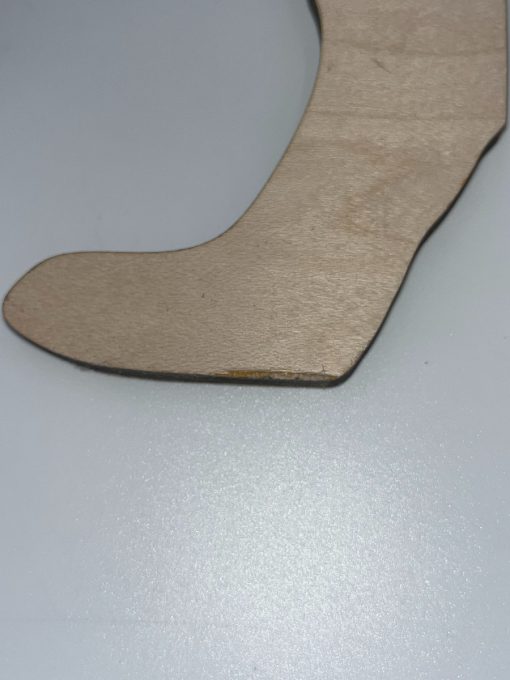 Image of cosmetic blemish (small chip on paw) on a Golden Retriever dog breed solid silhouette wooden cutout
